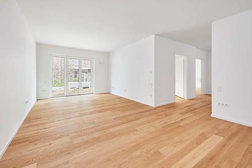Ausgebautes Wohnzimmer mit Parkett der Wohnung D33 im Neubauprojekt Constanze im ConstantinQuartier in Hannover List.